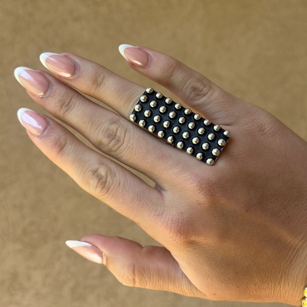 Elegant Black and Gold Studded Ring